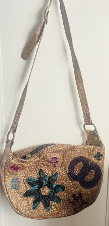 Beige Leather purse designed by Dr. Clayton Lang